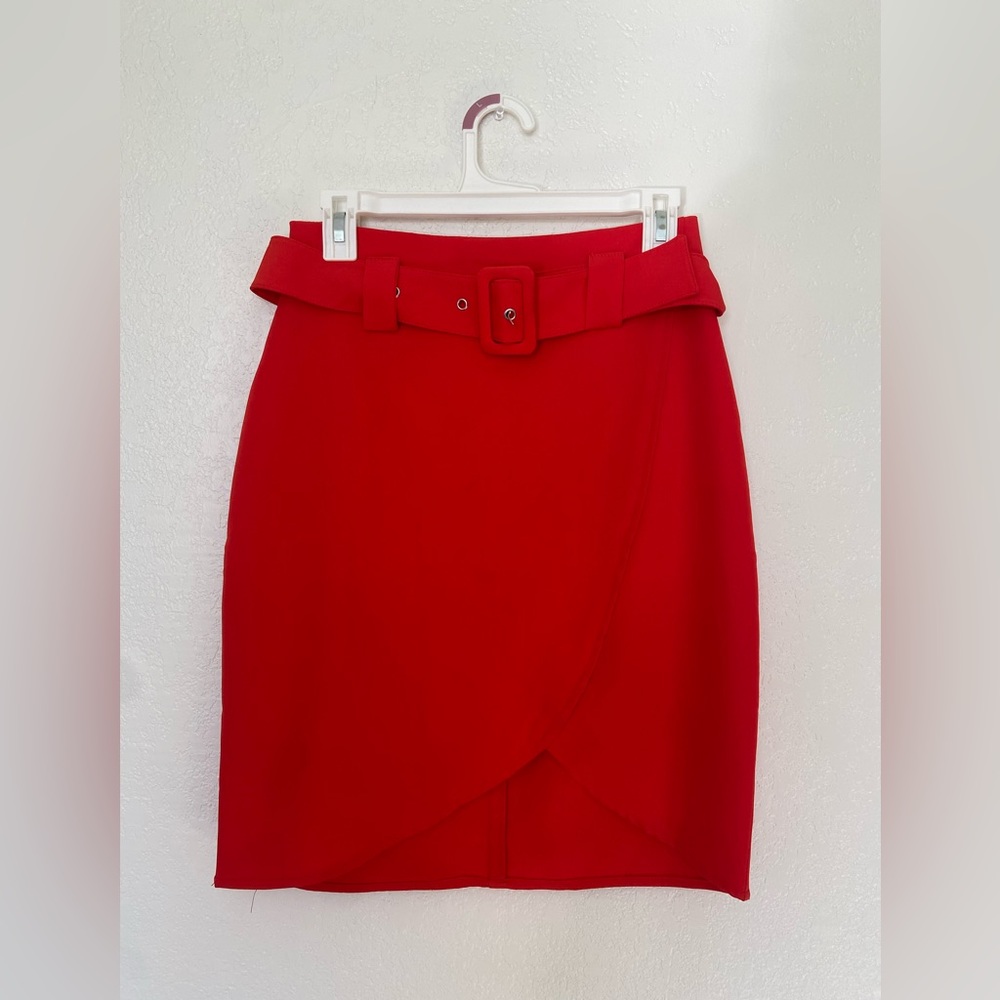 Red pencil skirt with attached belt. Thrifted in Austria.